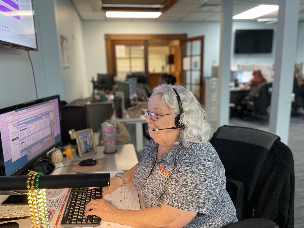 WTS office team member assisting with dispatch