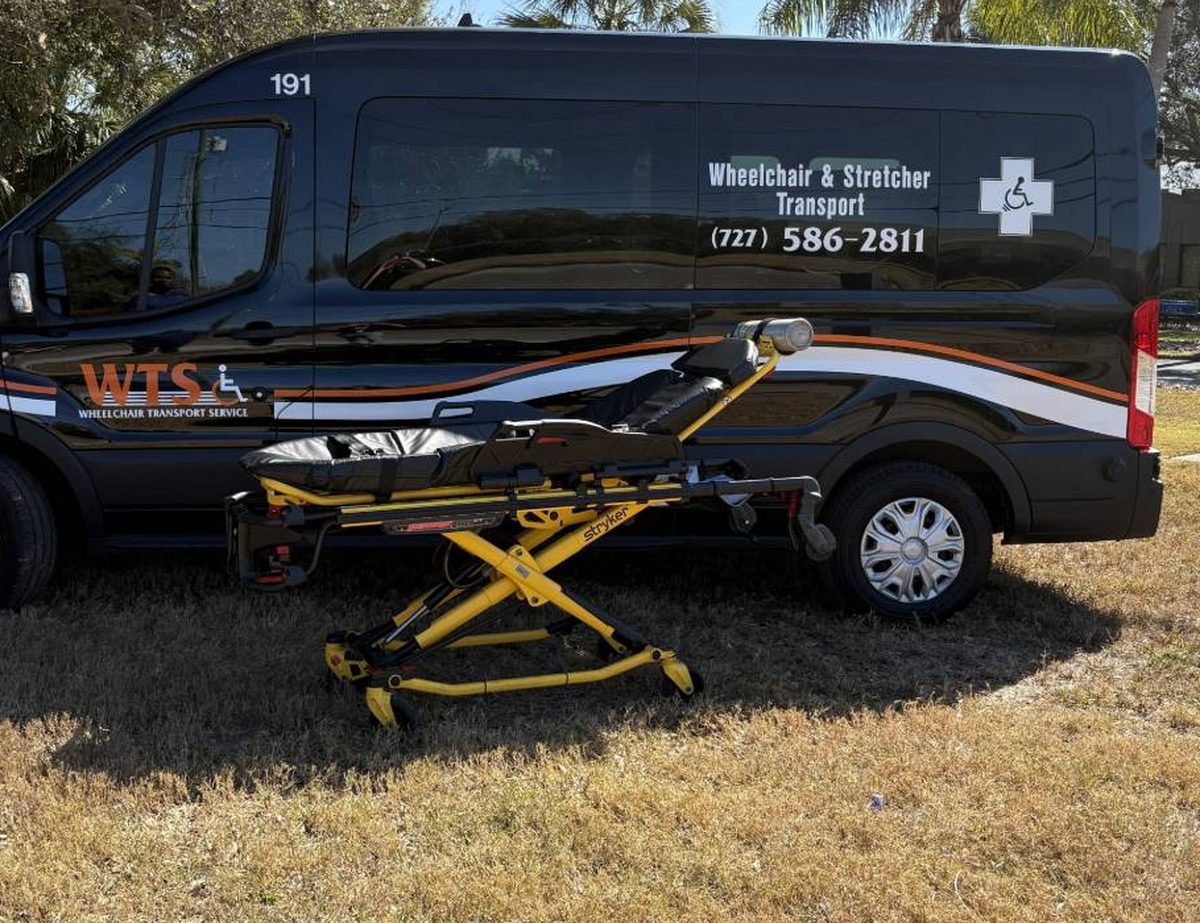 WTS stretcher transport van with a stretcher in front